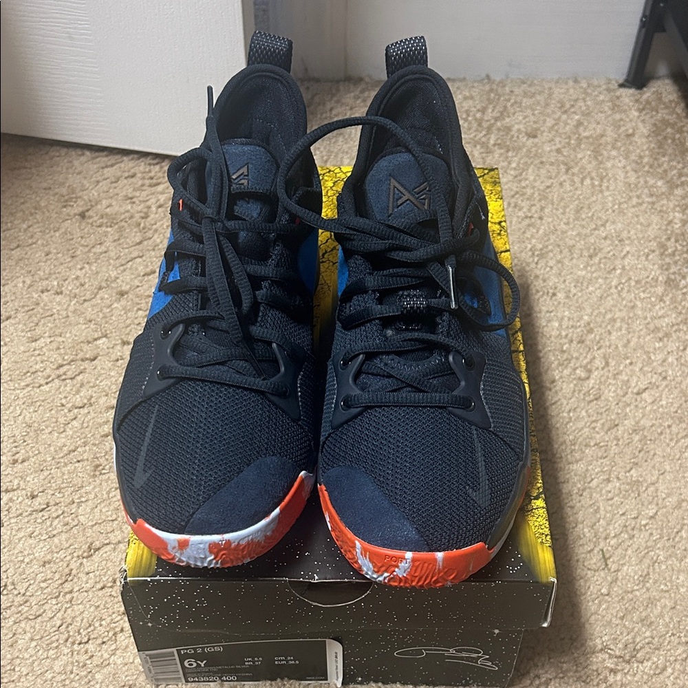 Nike Black and Blue Sneakers with Red Soles